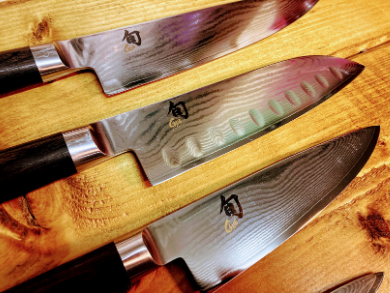 closeup of three Shun kitchen knives, freshly sharpened at norfolk sharpening, a professional knife and tool sharpening service