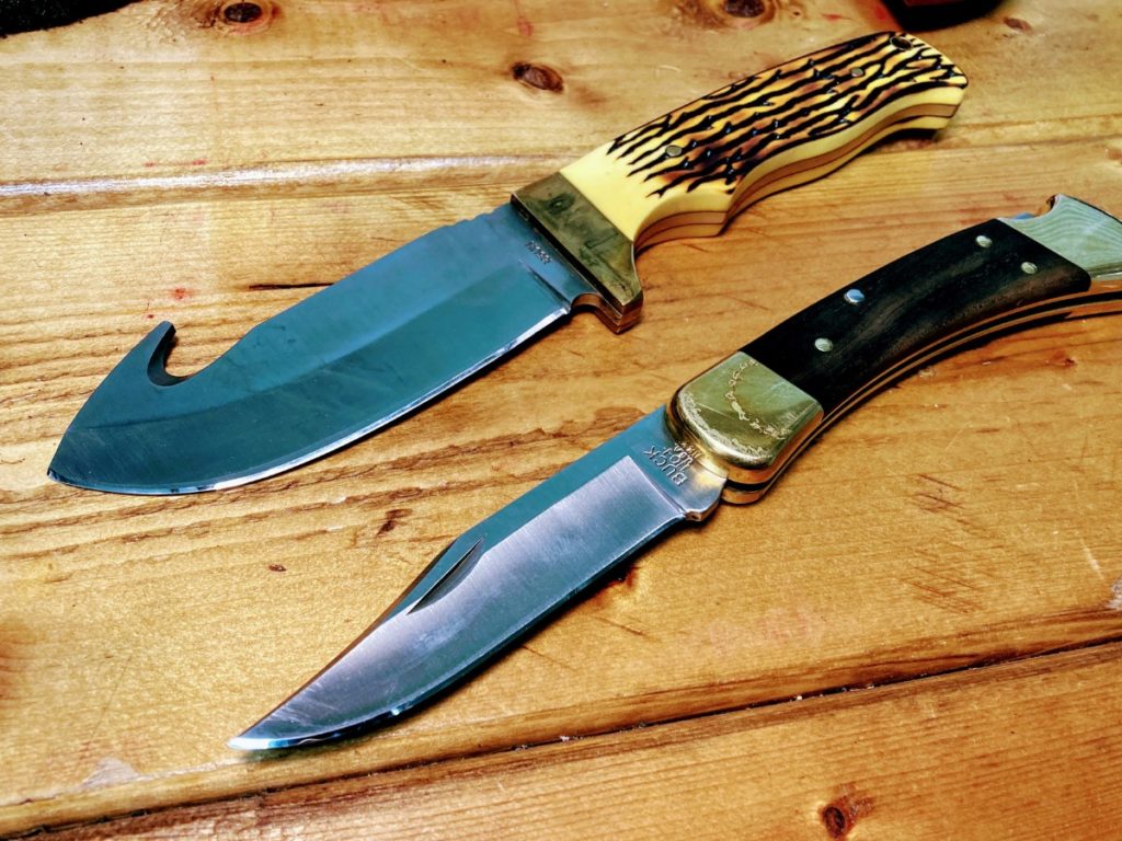 freshly sharped pocket knife and a fixed blades knife with mirror polished bevels